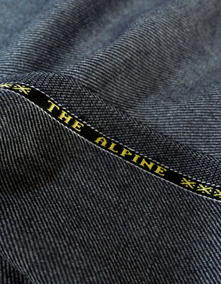 Grey Tweed Fabric Logo